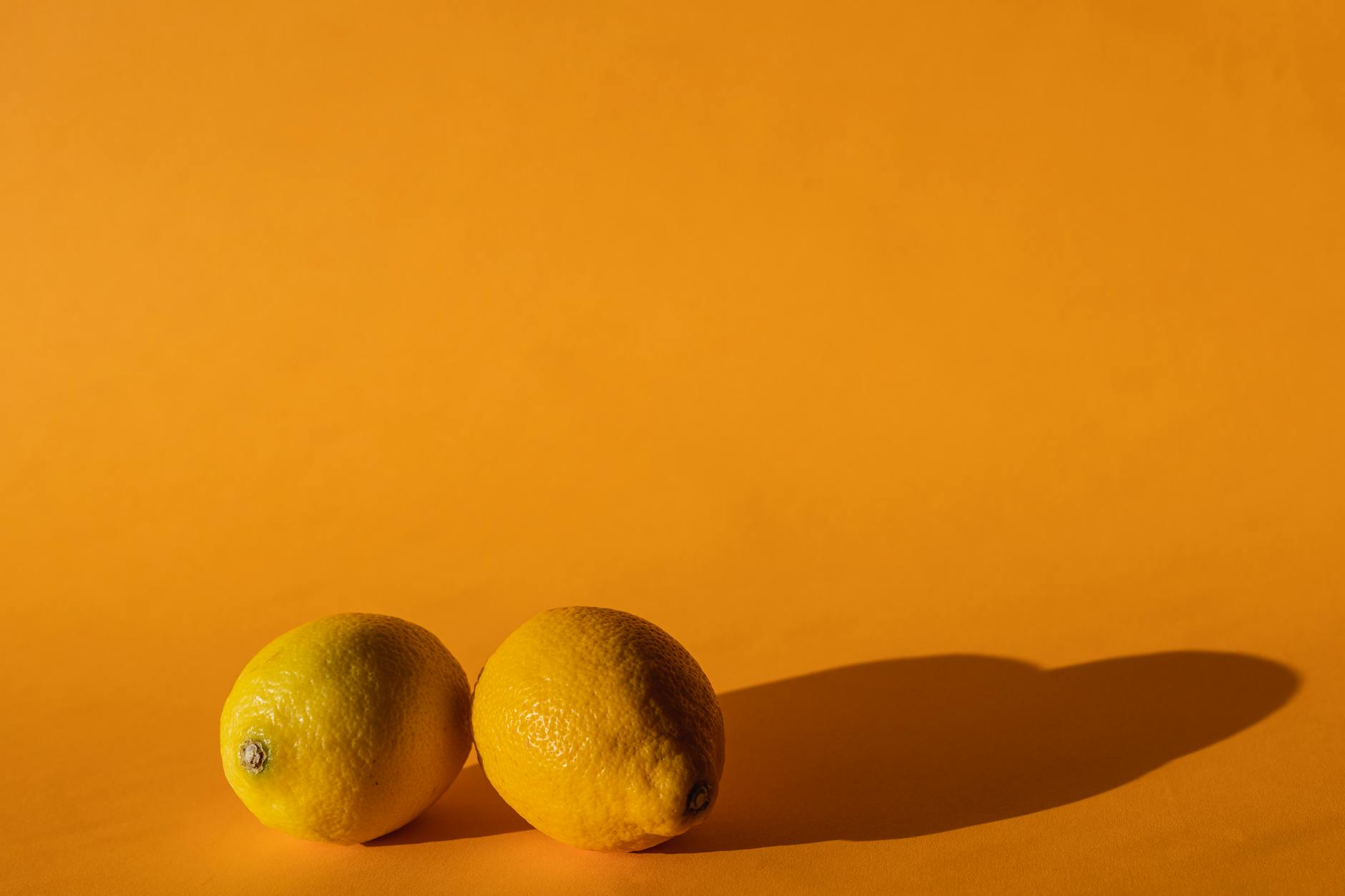 Bright yellow lemons on a vibrant background, symbolizing restored sensation and vitality